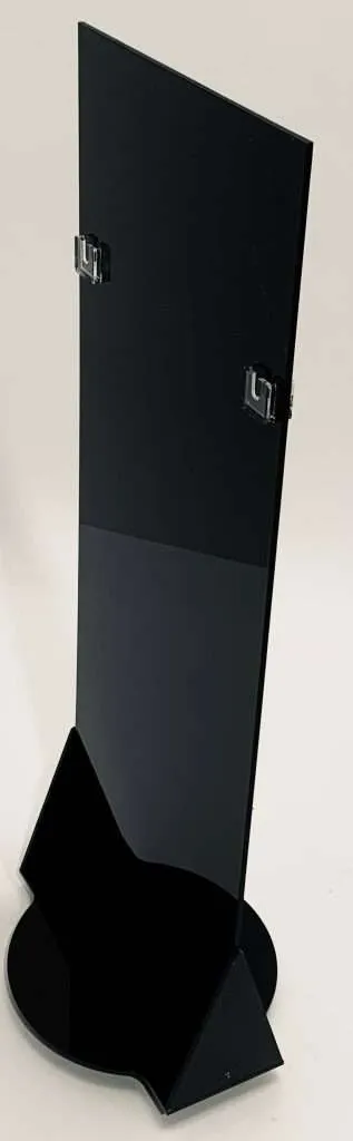 Tall black acrylic sign holder stand with integrated clips and a shaped base.