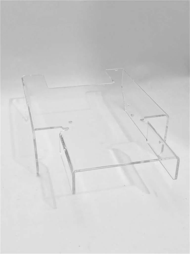 Clear acrylic protective cover custom-shaped to fit over laboratory equipment