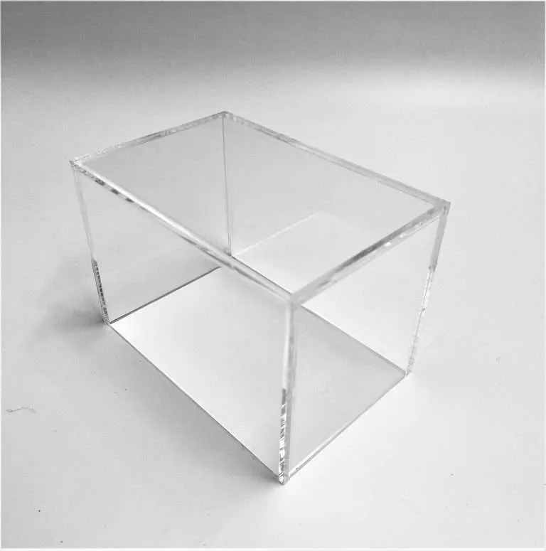 Clear acrylic open-top five-sided riser box with bonded, polished edges.