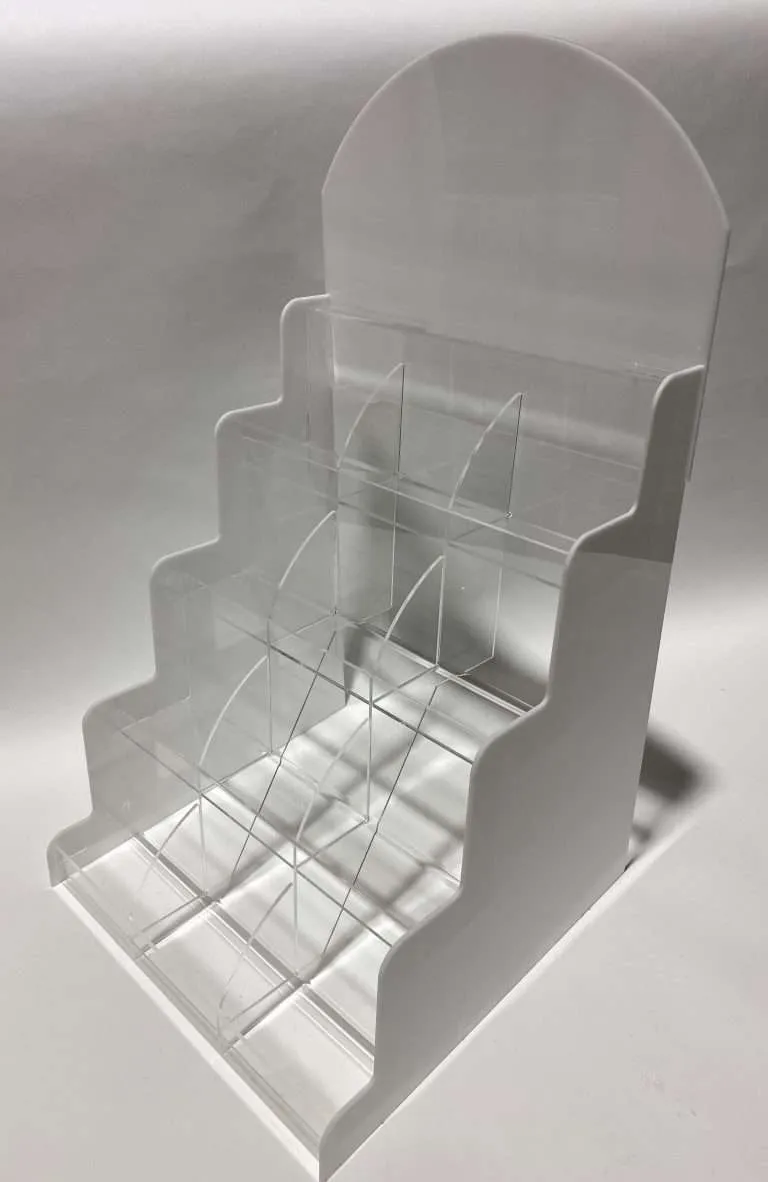 Stepped clear and white acrylic retail display prototype with dividers